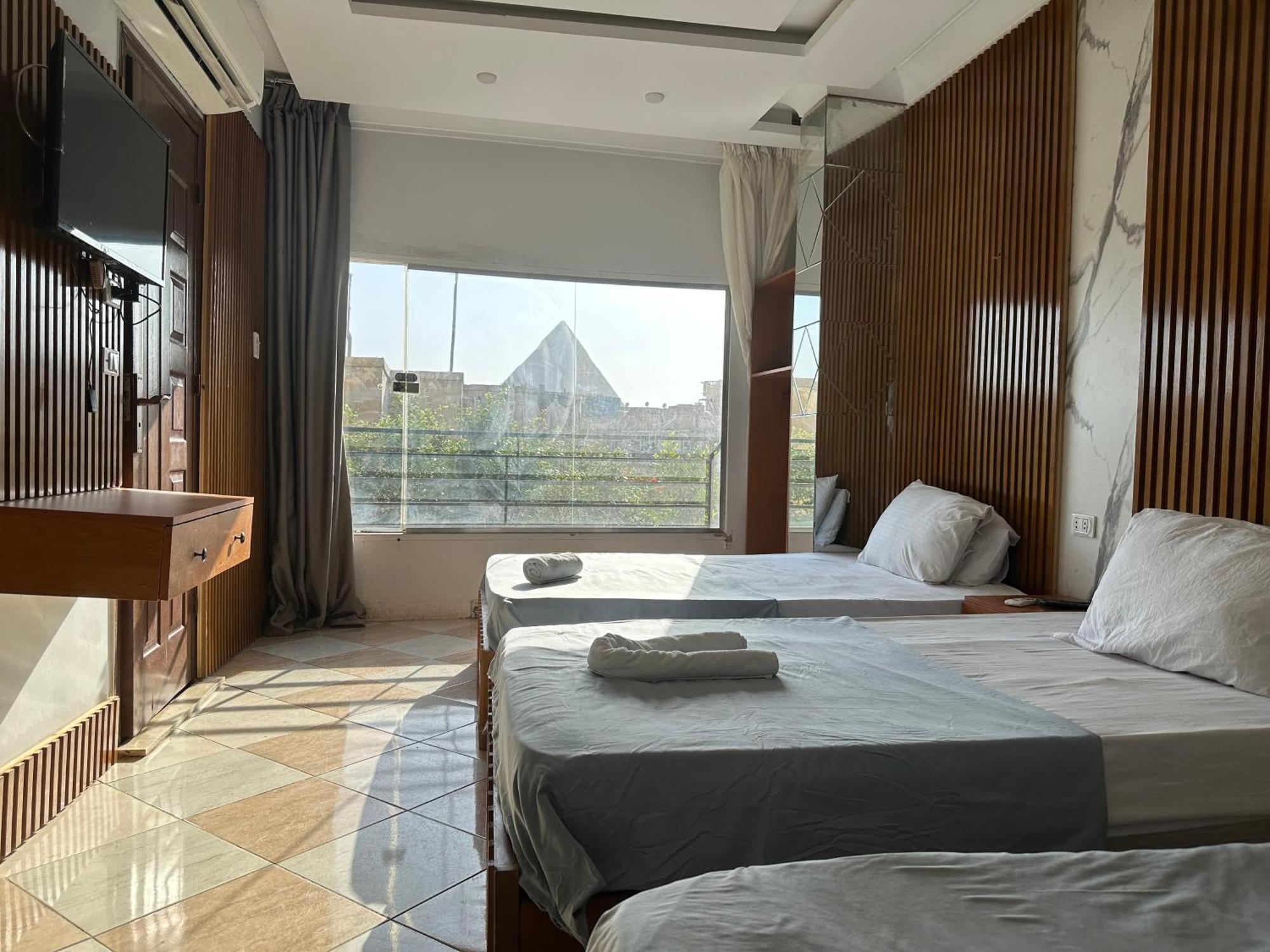Pyramids Family Inn Kafrat al Jabal Exterior photo